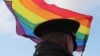 A law enforcement officer stands guard during the LGBT community rally "X St.Petersburg Pride" in central Saint Petersburg, Russia August 3, 2019. REUTERS/Anton Vaganov