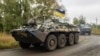 Украинские военнослужащие возле поселка Казачья Лопань, недалеко от границы с Россией, освобожденного накануне ВСУ от российской армии. Харьковская область, 16 сентября 2022 года